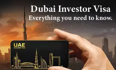Dubai beachfront skyline with tall buildings and blue sky with clouds