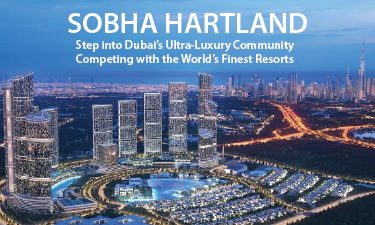 Dubai city skyline with modern buildings and palm trees along a wide street in daylight