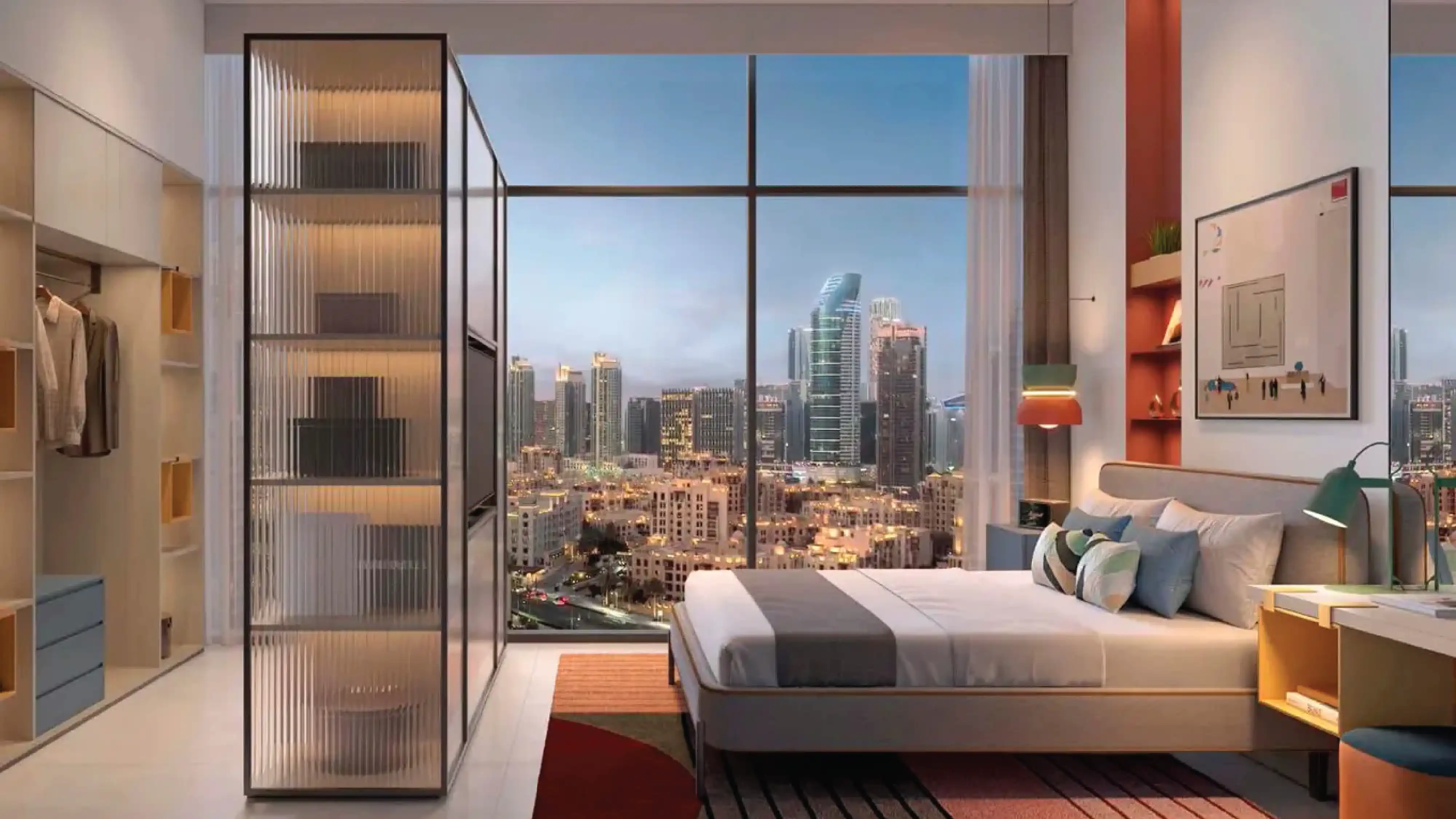 Dubai city skyline with modern buildings and palm trees along a wide street in daylight