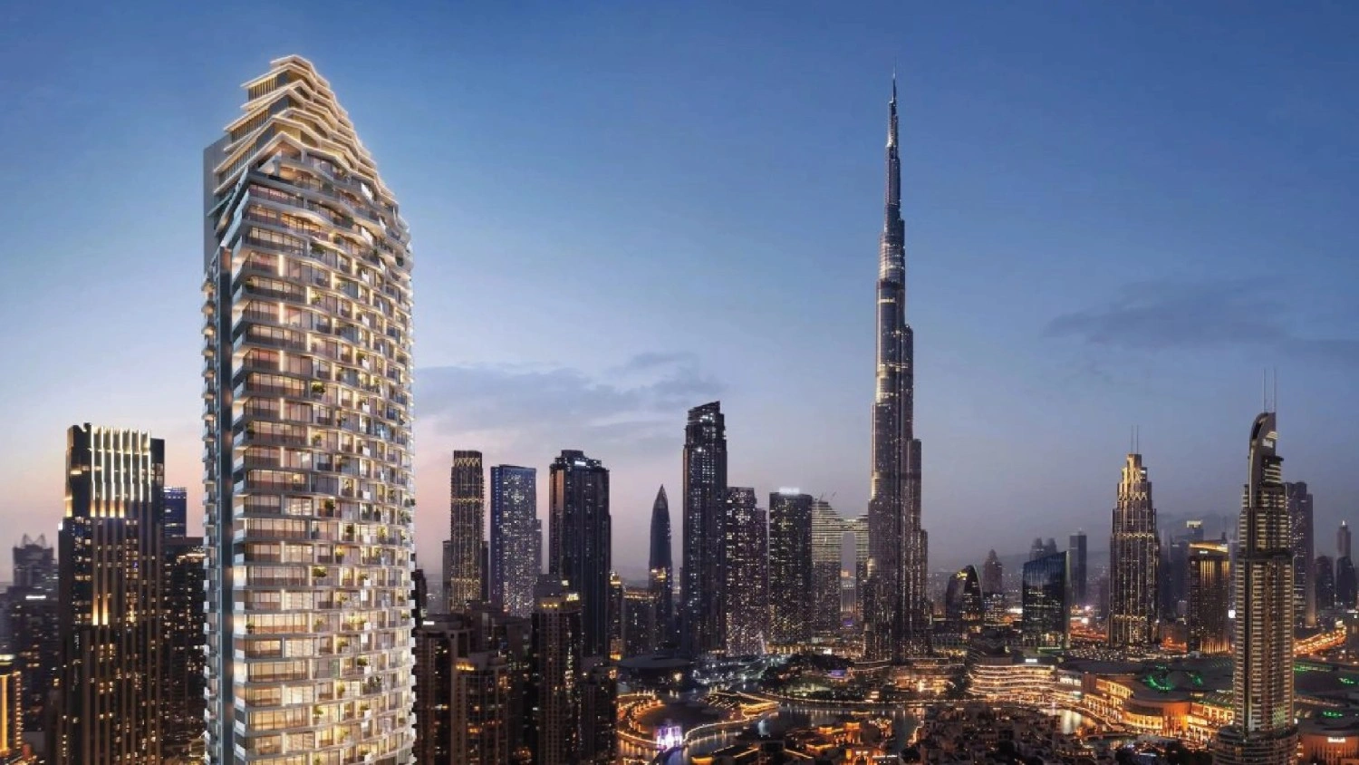 Dubai beachfront skyline with tall buildings and blue sky with clouds