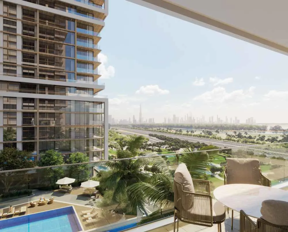 Aerial view of a luxury villa community in Dubailand with lush green landscaping.
