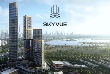 Modern city skyline with tall glass buildings and blue sky